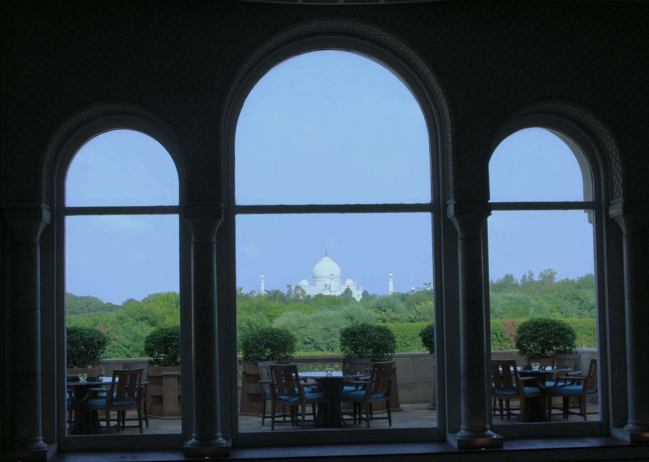 Taj Mahal through ornate arches